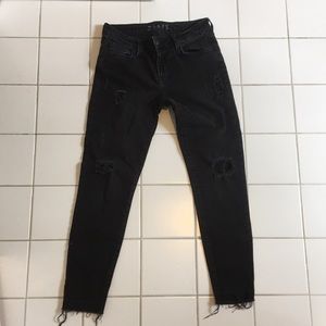 Low rise ripped black jeans